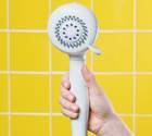 Moen handheld shower offers innovative palm feature Moen handheld shower offers innovative palm feature