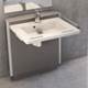Height-adjustable sinks feature integrated grab bars Height-adjustable sinks feature integrated grab bars