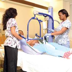 Staff at Levindale Hebrew Geriatric Center in Baltimore strive to make sure residents are lifted properly from their bed to avoid injury or stress. Staff at Levindale Hebrew Geriatric Center in Baltimore strive to make sure residents are lifted properly from their bed to avoid injury or stress.