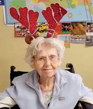 LaVern in a Christmas-themed weather report LaVern in a Christmas-themed weather report