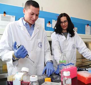 Lewis Reis and Milica Radisic, working with special biomaterial. Lewis Reis and Milica Radisic, working with special biomaterial.