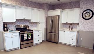 The “home” therapy center helps residents focus on the goal of ultimately returning to their own homes, its creators say. The “home” therapy center helps residents focus on the goal of ultimately returning to their own homes, its creators say.