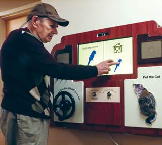 The tool is reiminiscent of an old-fashioned radio or TV to help residents feel comfortable using it. The tool is reiminiscent of an old-fashioned radio or TV to help residents feel comfortable using it.